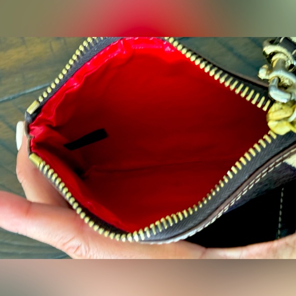 Elevate your style with this chic Dooney & Bourke Camouflage Brown Wristlet - Picture 3 of 4